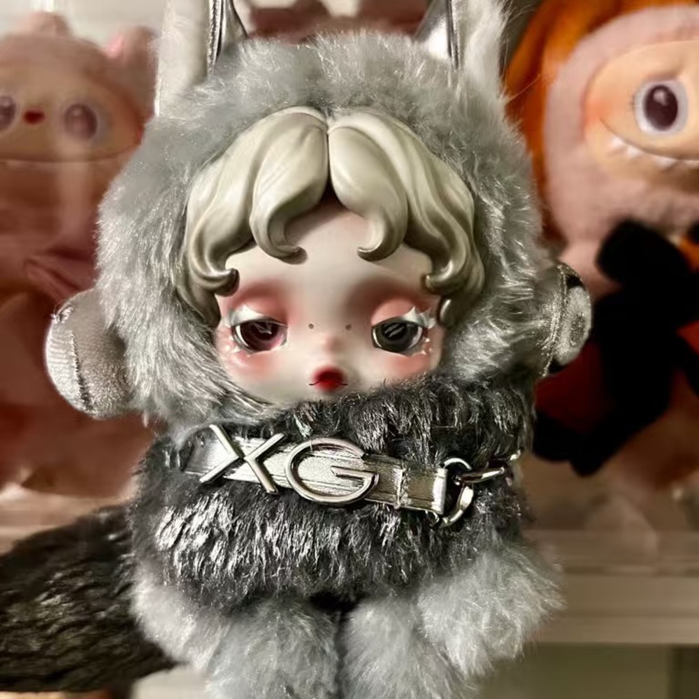 Silver and Gray Plush Doll